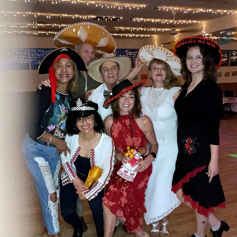 Guests posing together on the dance floor